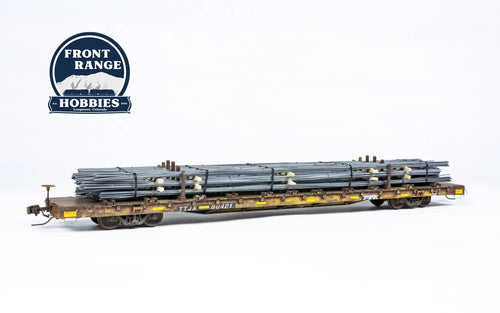 HO Scale ScaleTrains Rivet Counter BSC F68BH Finger Rack Flatcar, TTJX/1991 Speed Logo #80421 with Rebar Load Front Range Hobbies