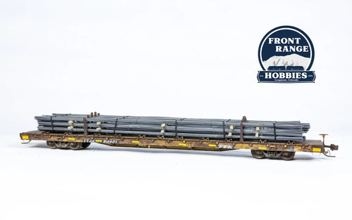 HO Scale ScaleTrains Rivet Counter BSC F68BH Finger Rack Flatcar, TTJX/1991 Speed Logo #80421 with Rebar Load Front Range Hobbies